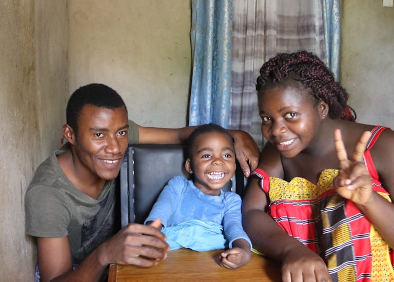 Bright (2 years, brain damage) with his parents Roben and Christabel