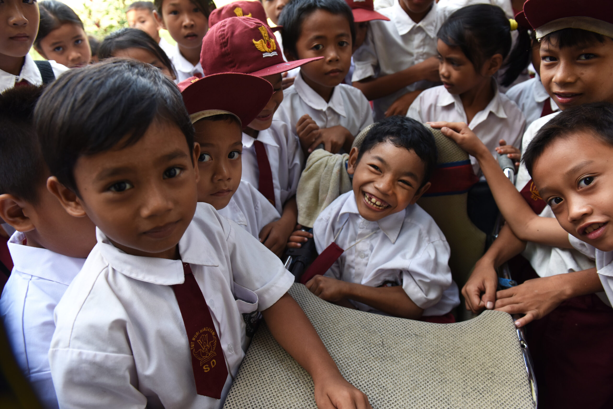 Moses during breaktime, having fun with his friends.