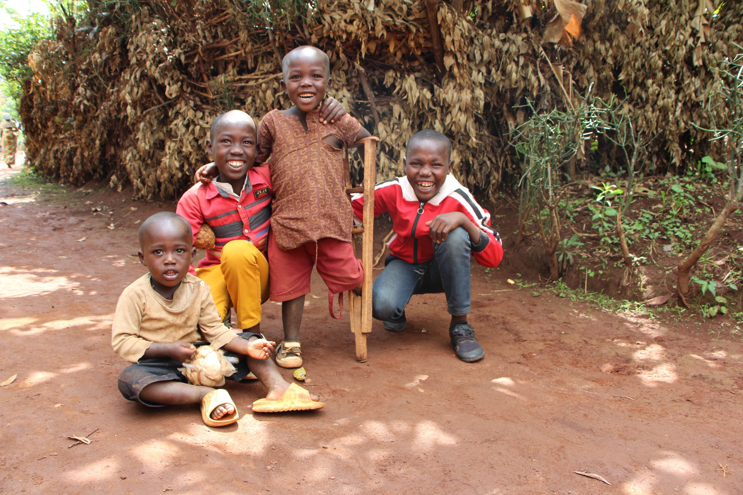 A group of children smiling at the camera